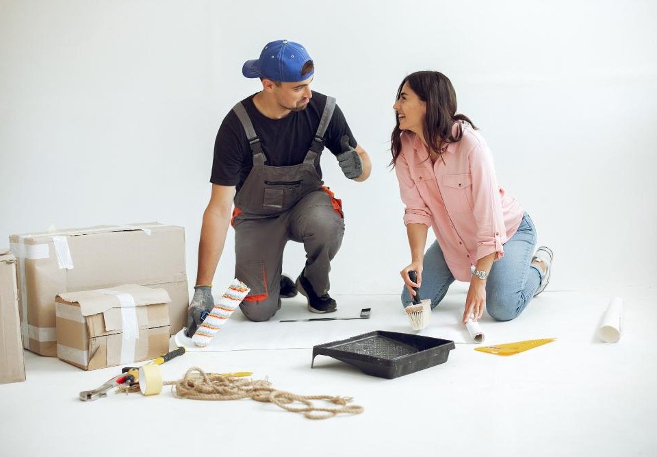 A young couple doing renovation